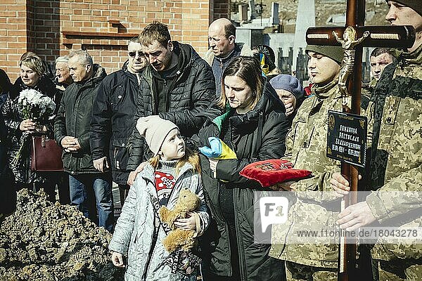 Burial of Oleg Yashchishin  Kirilo Vishivaniy  Sergey Melnik and Rostislav Romanchu at Lychatik cemetery  the four officers killed two days earlier in a Russian missile attack in a military camp near the border with Poland in Yavoriv  at least 35 people died  Lviv  Ukraine  Europe