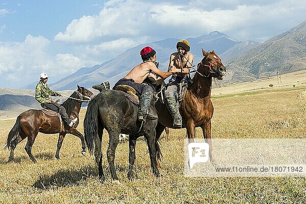 Atpen Audaraspak  Traditional Kazakh Arm Wrestling on Horseback  Gabagly National Park  Shymkent  South Region  Kazakhstan  Central Asia  For editorial use only  Asia