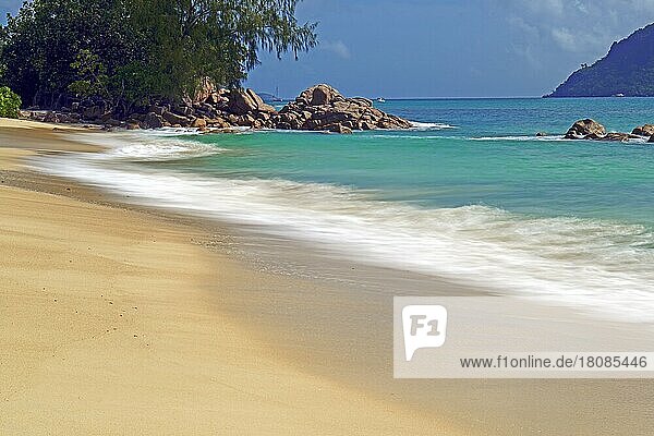 Beach and granite rocks at Anse Possession  long exposure  Praslin Island  Seychelles  Africa