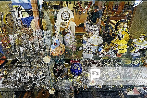 Shop window  antique shop with glasses and porcelain  Lindau  Swabia  Bavaria  Germany  Europe