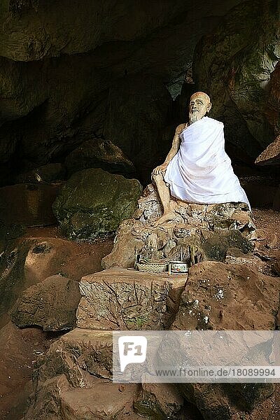 Sitting statue of a monk  cave temple Wat Tham Suwan Khuha  Phang Nga  Thailand  Asia