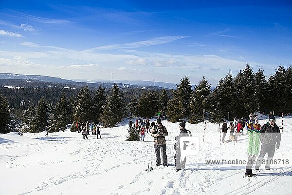 Group of hikers on the snow-covered Brocken in the Harz mountains  Saxony-Anhalt  Germany  Europe