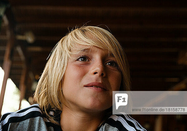 Portrait of a cute caucasian boy looking away