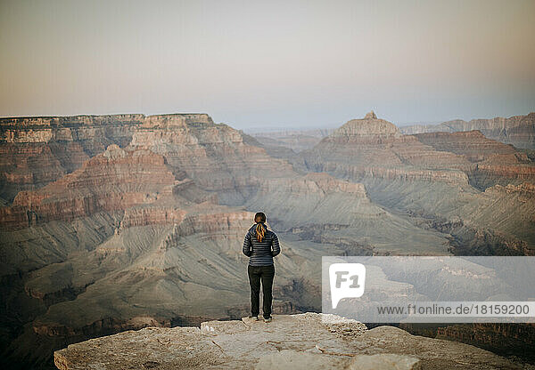 One woman looks out at view of Grand Canyon National Park  Arizona