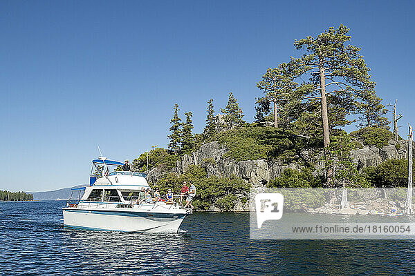 A group of friends enjoy a cruise around Emerald Bay.
