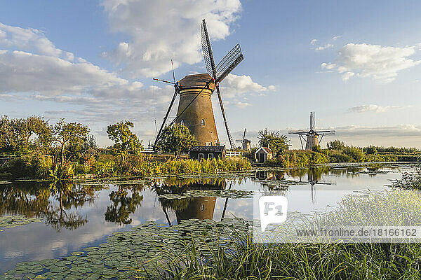 Netherlands  South Holland  Kinderdijk  Countryside river and historic windmills