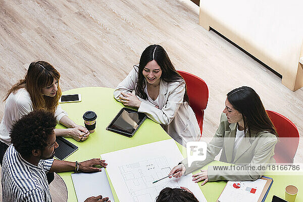 Business team having a meeting at table in conference room