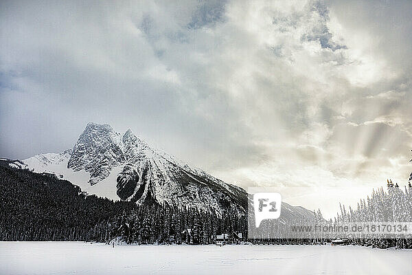 View over Emerald Lake in the winter with the Rocky Mountains in the background  Yoho National Park; British Columbia  Canada