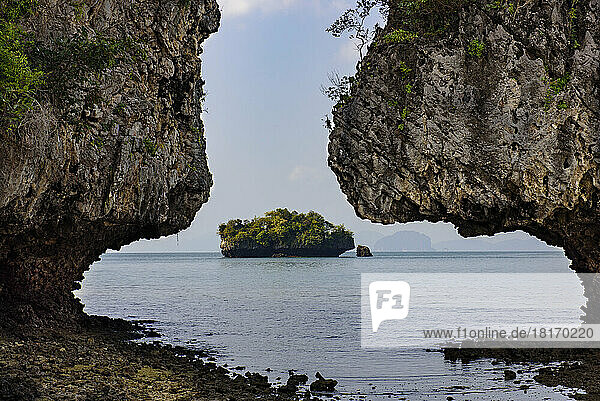 Karst formations with island; Thailand