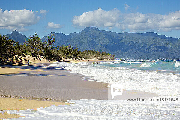 Baldwin Beach on a beautiful winter day  north shore of Maui with West Maui Mountains in the background; Paia  Maui  Hawaii  United States of America