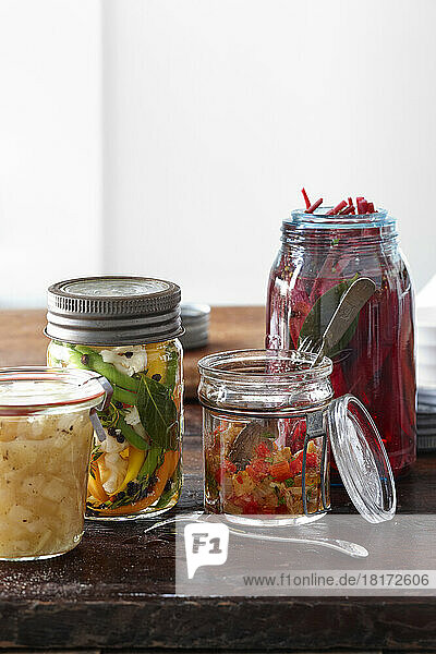Multiple Jars of Homemade Pickled Vegetable Relish and Salsa