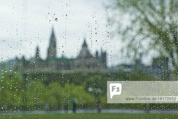 View of Parliament Buildings Through Rain-covered Window of the National Gallery of Canada  Ottawa  Ontario  Canada