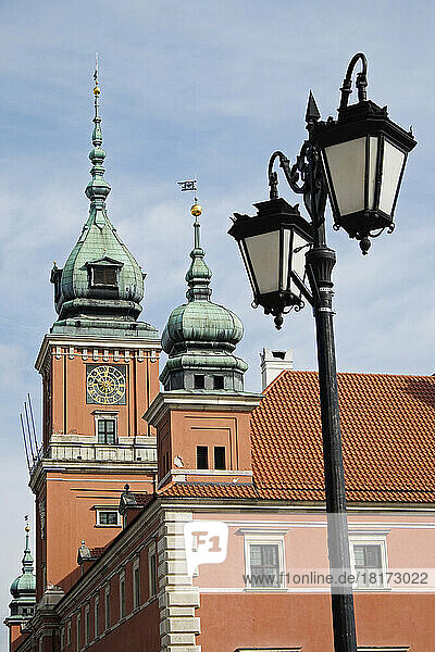 Lampost by Clock Tower of Royal Castle  Stare Miasto  Warsaw  Poland