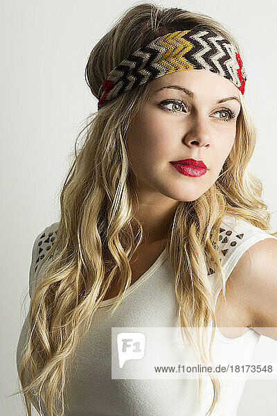 Portrait of Woman wearing Headband  Studio Shot on White Background