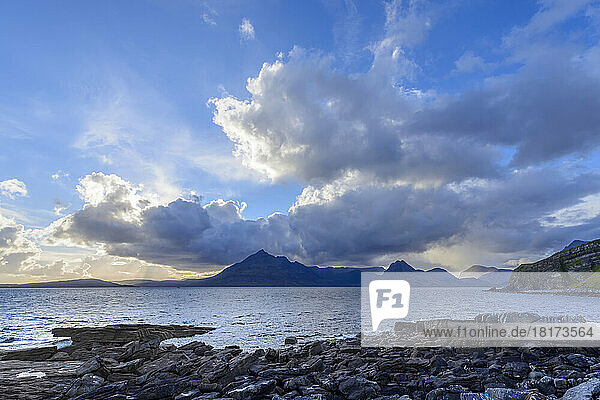 Scottish coast with dramatic clouds over Loch Scavaig on the Isle of Skye in Scotland  United Kingdom