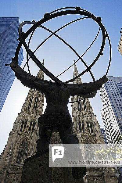 Atlas Statue at Rockefeller Center  St Patrick's Cathedral in the Background  Manhattan  New York City  New York  USA