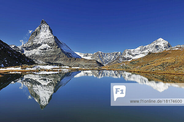 Matterhorn reflected in Lake Riffelsee  Zermatt  Alps  Valais  Switzerland