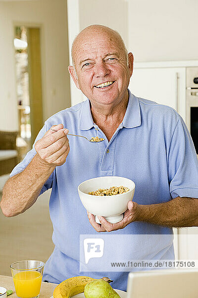 Portrait of Man Eating Cereal