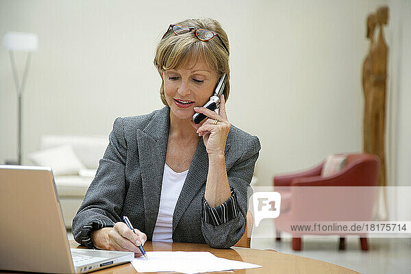 Businesswoman Using Cell Phone