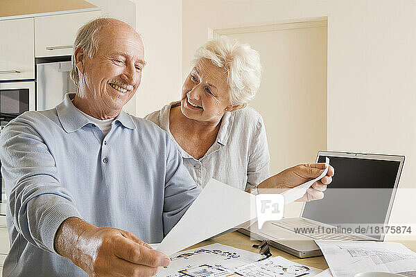 Couple Looking at Floor Plans