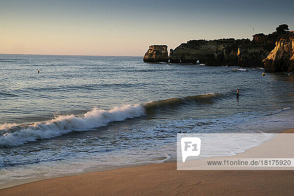 Waves hitting Beach at Lagos  Algarve Coast  Portugal