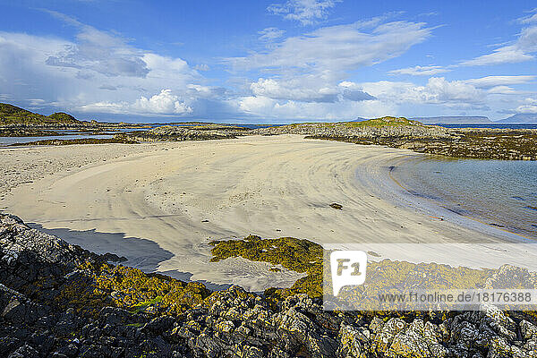 Scottish coast with sandy beach in spring at the port of Mallaig in Scotland  United Kingdom