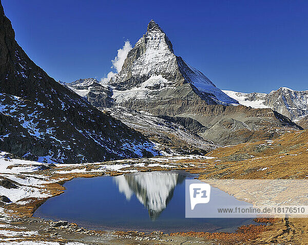 Matterhorn reflected in Lake Riffelsee  Zermatt  Alps  Valais  Switzerland