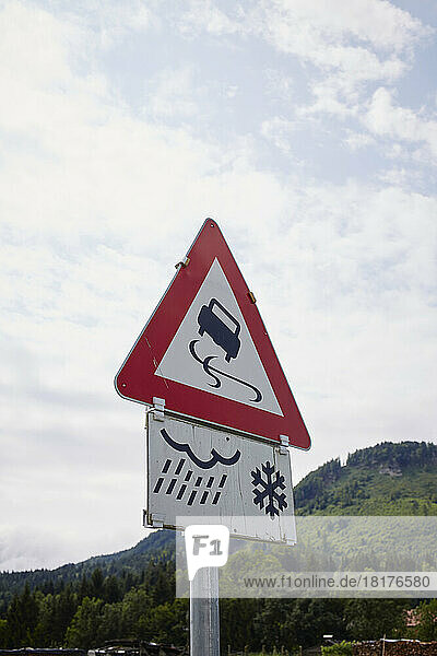 Slippery When Wet and Icy Conditions Sign  Austria