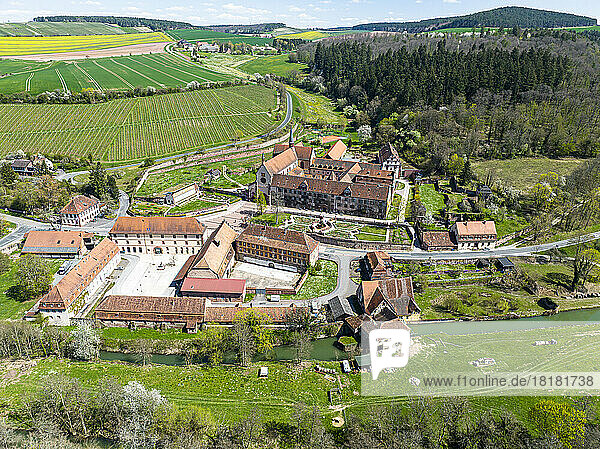 Germany  Baden-Wurttemberg  Wertheim  Aerial view of Bronnbach Monastery and surrounding landscape