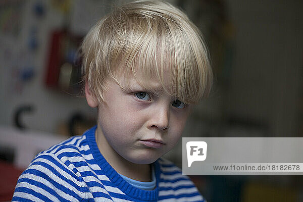 Portrait of angry little boy