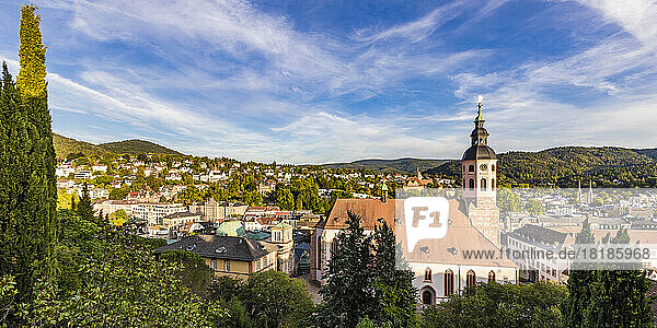 Germany  Baden-Wurttemberg  Baden-Baden  Panoramic view of town in Black Forest range with church in foreground