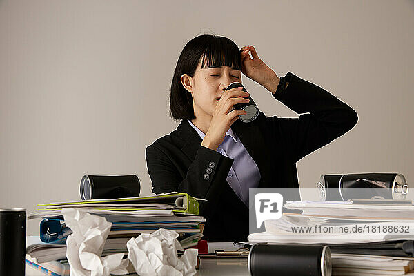 Tired Japanese businesswoman