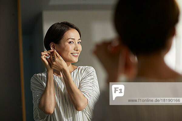 Japanese woman getting ready at home