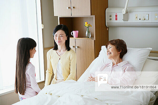 Three generation Japanese women in the hospital room