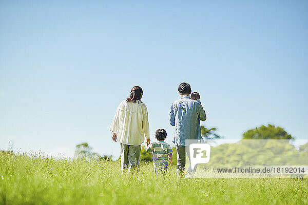 Blue sky and Japanese family