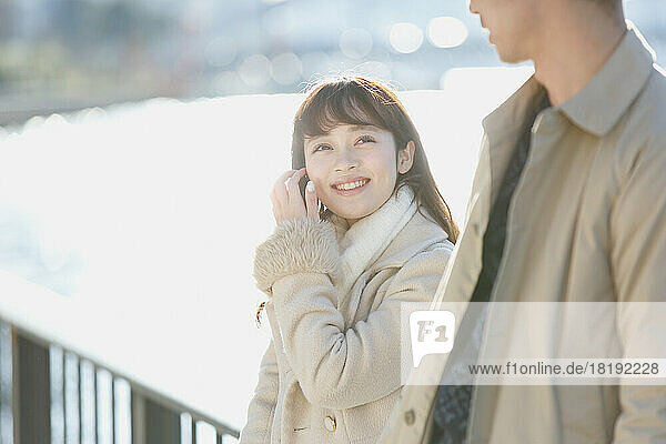Japanese couple talking with a smile