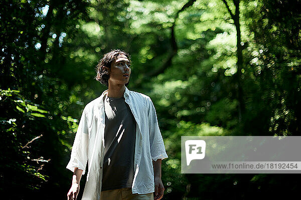 Japanese man in the forest