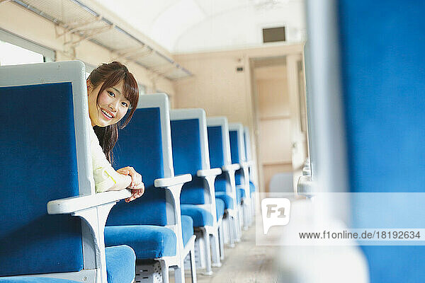Japanese woman having fun in the train