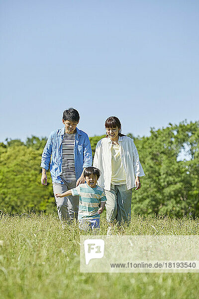 Japanese parents watching over running child