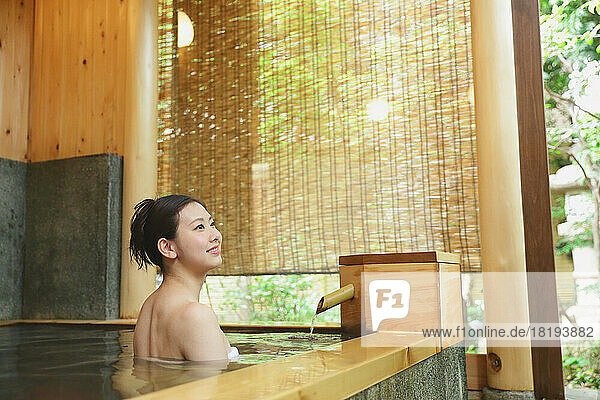 Japanese woman enjoying her hot spring trip