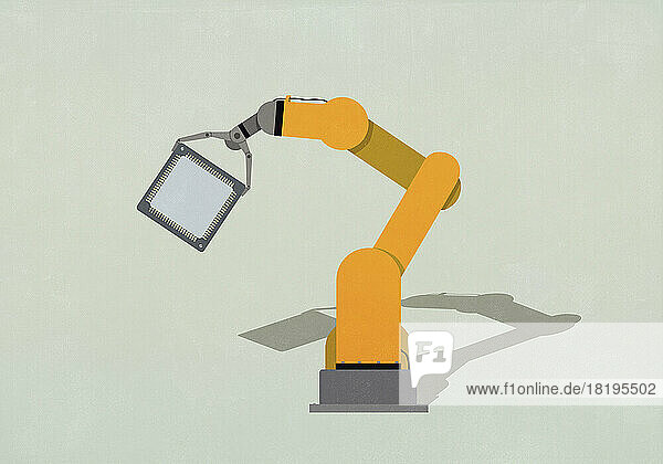 Robotic arm holding  manufacturing semiconductor on green background