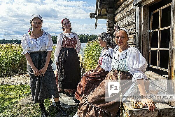 Traditionla dressed women  Unesco site Kizhi island  Karelia  Russia  Europe