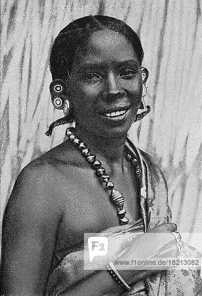 Swahili  Swahili  Girl from German East  Colony  Tanzania  Historic  digitally restored reproduction of an original from the early 20th century  exact original date unknown  Africa