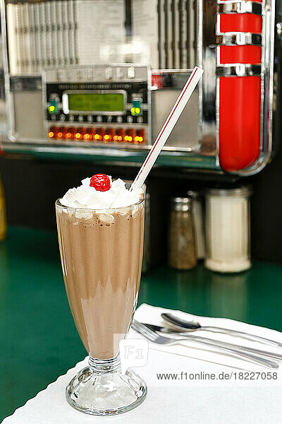 Chocolate milkshake on diner table