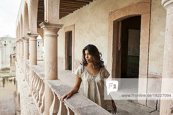 Mexico  San Felipe  Woman posing at old abandoned hacienda