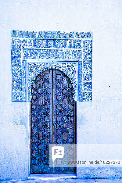 Spain  Granada  Blue ornate door and carvings of the Alhambra
