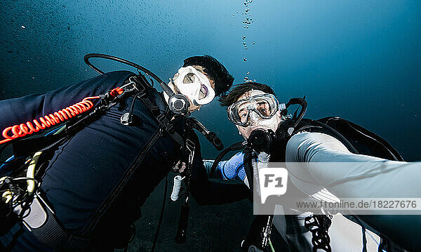 divers taking selfie during a dive at the gulf of Thailand