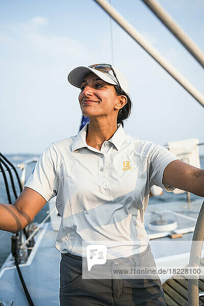 Proud Captain Shivani Sood on Newport sailing charter Heritage 12M