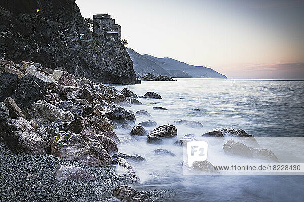 monterosso beach at sunrise in long expo