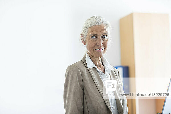 Portrait of mature businesswoman in office